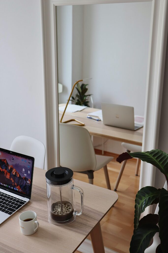 Clean workspace with laptop and coffee representing simple affiliate marketing for beginners and online business lifestyle